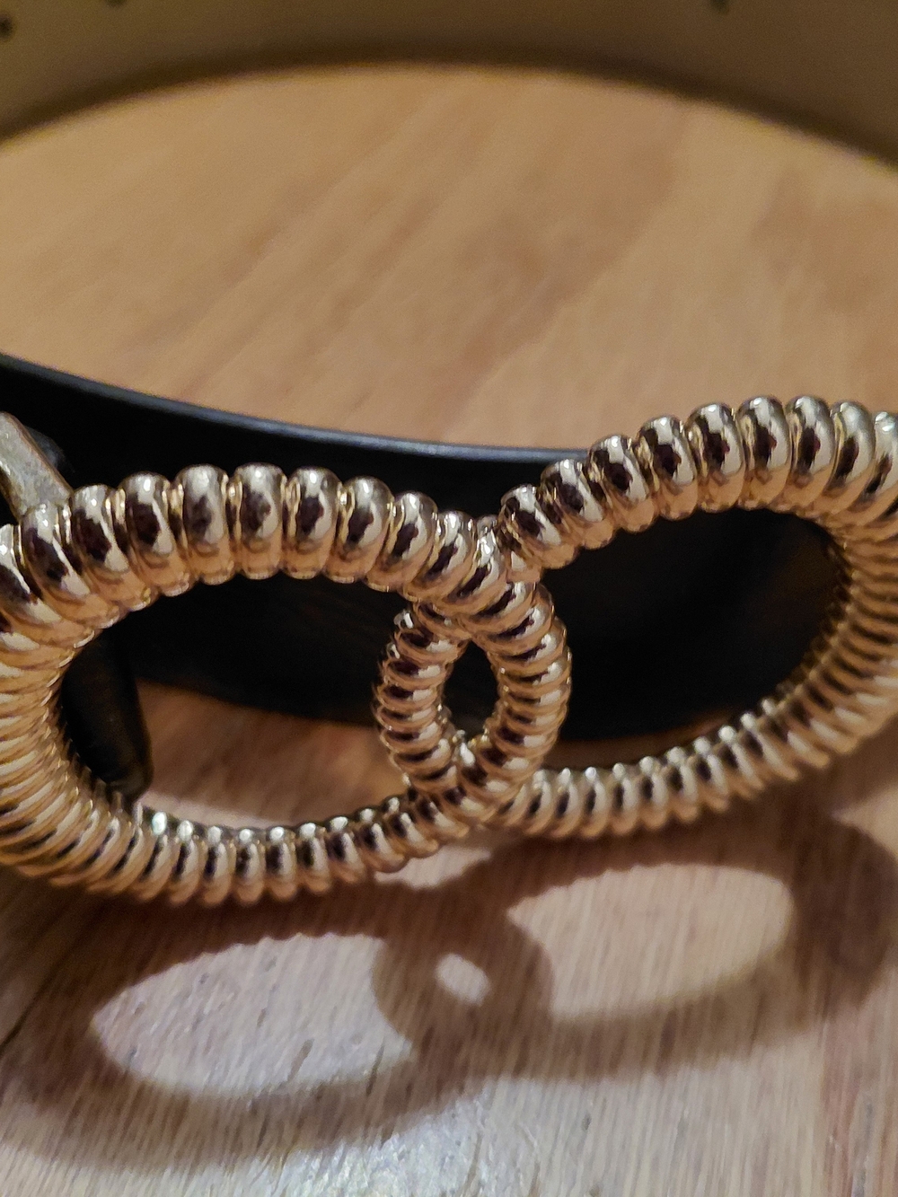 Vince Camuto Black Belt with Gold Twisted Ring Detail